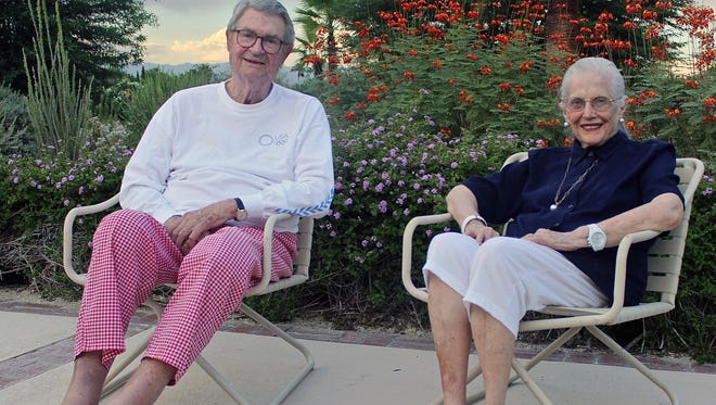 Ric and Rozene Supple, sitting on the patio of their residence in Palm Springs in 2015. are closing their last local radio stations.