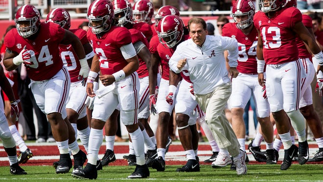 Alabama head coach Nick Saban takes the field before warmups for the Tennessee game at Bryant-Denny Stadium in Tuscaloosa, Ala. on Saturday October 21, 2017. (Mickey Welsh / Montgomery Advertiser)