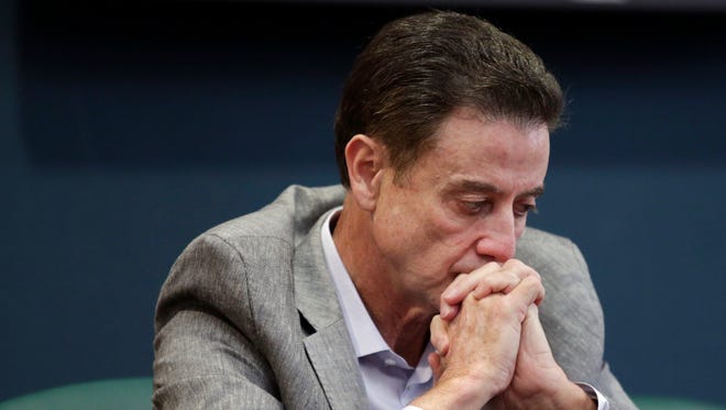 Louisville basketball coach Rick Pitino listens during an NCAA college basketball news conference Thursday, June 15, 2017 in Louisville, Ky. Pitino has been put on unpaid administrative leave by the school.