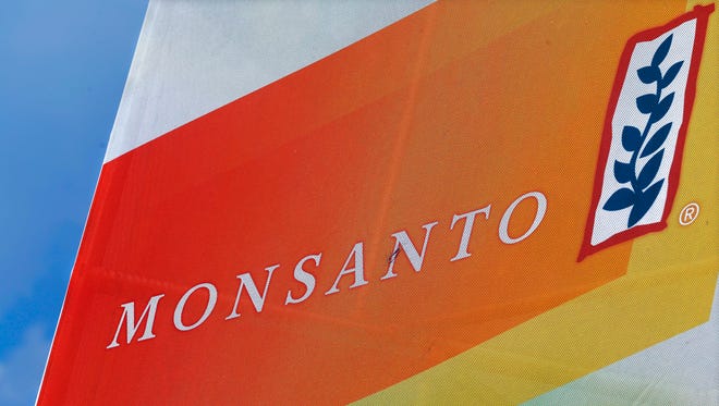 FILE - This Aug. 31, 2015, file photo, shows the Monsanto logo on display at the Farm Progress Show in Decatur, Ill.