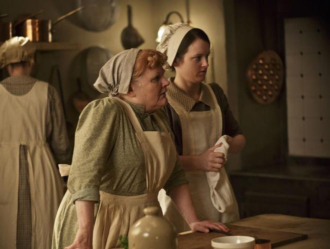 Lesley Nicol as Mrs. Patmore (left) and Sophie McShera as Daisy appear in the fourth season of “Downton Abbey.” The series has caught on in more than 200 countries.