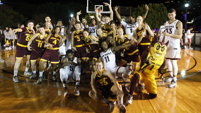 ASU men's and women's basketball pose for a photo during Mill Madness at the corner of 7th and Mill Avenue in Tempe on October 14, 2016.