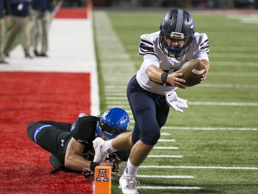 Perry quarterback Brock Purdy scores a touchdown against