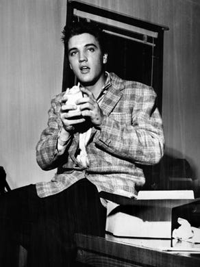 The U.S. Army provided a box lunch for Elvis Presley and other inductees the day they reported for duty March 24, 1958.