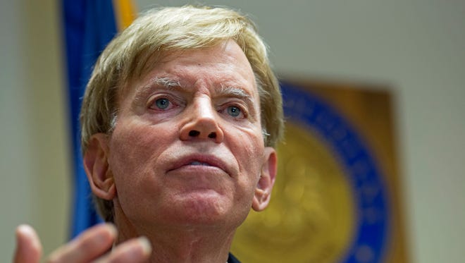 Former Ku Klux Klan leader David Duke talks to the media at the Louisiana Secretary of State's office in Baton Rouge, La., on Friday, July 22, 2016, after registering to run for the U.S. Senate, saying "the climate of this country has moved in my direction."