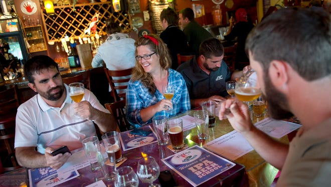 Jameson Ward (left), Brooke Malone, her husband Mike Malone, and Alan Dritenbas, all of Vero Beach, attended Beer School in 2015. Several classes are scheduled in August at the Kilted Mermaid.