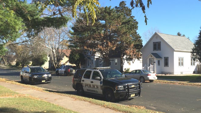 Marshfield police vehicles in the 300 block of North Maple Avenue on Nov. 8, 2015.