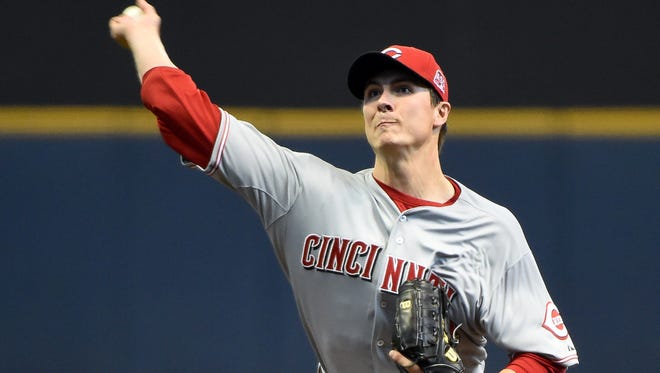 Reds pitcher Homer Bailey delivers in the first inning Thursday against the Milwaukee Brewers at Miller Park.