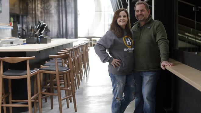 Bill and Michelle Tressler, owners of Hinterland Brewery, stand in the second-floor dining area of their new facility located in the Green Bay Packers' Titletown District on March 31. The restaurant and brewery is tentatively scheduled to open April 11, 2017.