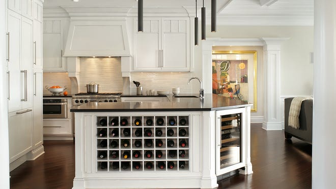 Ivee Fromkin, principal designer of I. Fromkin Interiors in Monmouth Beach, designed this kitchen with an island.