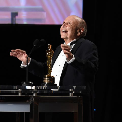 Casting director Lynn Stalmaster reacts on stage a