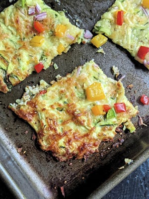 This vegetarian pizza is made with shredded zucchini, mozzarella and Parmesan cheeses and egg. 

{Gretchen McKay/Pittsburgh Post-Gazette/TNS]
