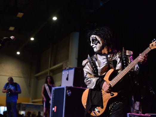 Mini Kiss plays at Hy-Vee Hall for BaconFest on Saturday