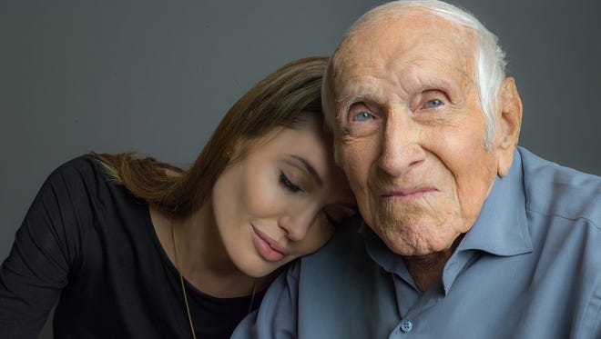 Angelina Jolie grew close to Louis Zamperini, the subject of her film "Unbroken." She screened the film for him before his death in July.