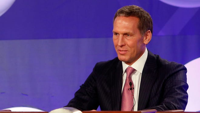 Toronto Raptors president Bryan Colangelo represents his team during the NBA basketball draft lottery, Tuesday, May 21, 2013 in New York.