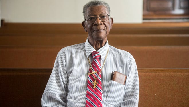Bishop Jimmy Sawyer poses for a portrait at Mathew Church of God on Herron Street in Montgomery on July 2, 2018. Sawyer founded the church in 2010 and is working on multiple community initiatives including revamping a local park and buying abandoned homes. 