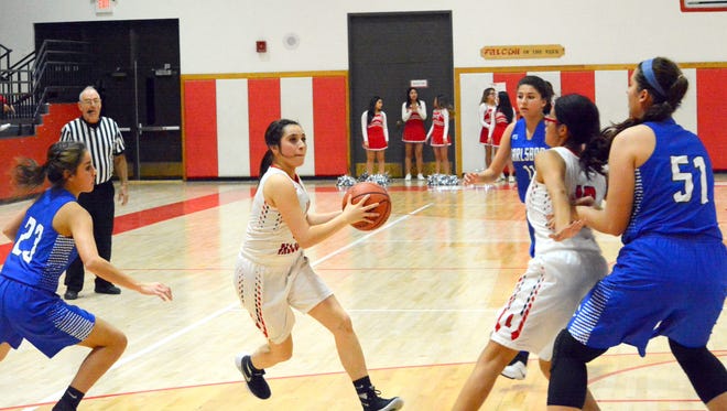 Loving's Anyssa Rodriguez sets up a shot in the first quarter Monday.