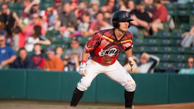 Indianapolis Indians center fielder Adam Frazier leads off of first during Saturday night's game. The Indians wore their #TeamIronMan jerseys for the game.