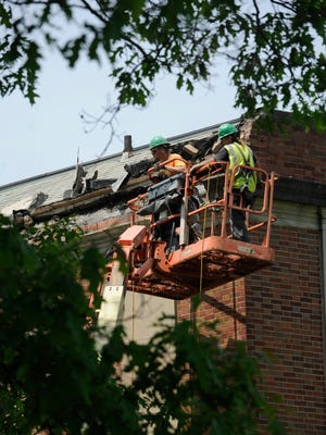 A construction crew works on the demolition of Smith Middle School in Chillicothe. The demolition of the structure will make way for one of two new grade-banded elementary campuses the district is looking to construct with help from the Ohio School Facilities Commission.