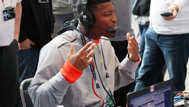 Feb. 20, 2015; Indianapolis; Florida State Seminoles quarterback Jameis Winston does a radio interview during the 2015 NFL combine at Lucas Oil Stadium.