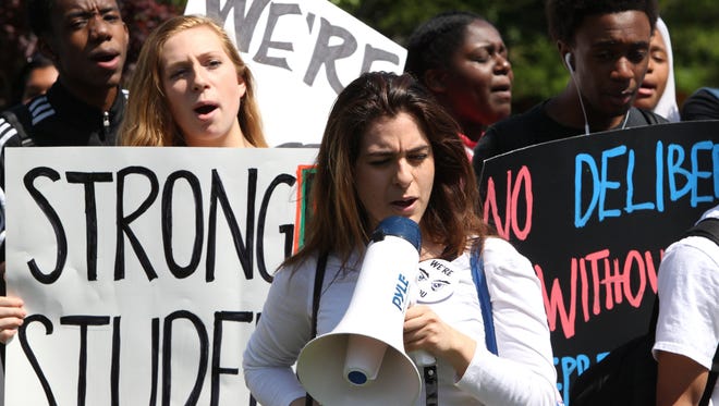Spring Valley and Ramapo High School students rally at Memorial Park in Spring Valley on May 20.  They were rallying against the conditions at their schools.