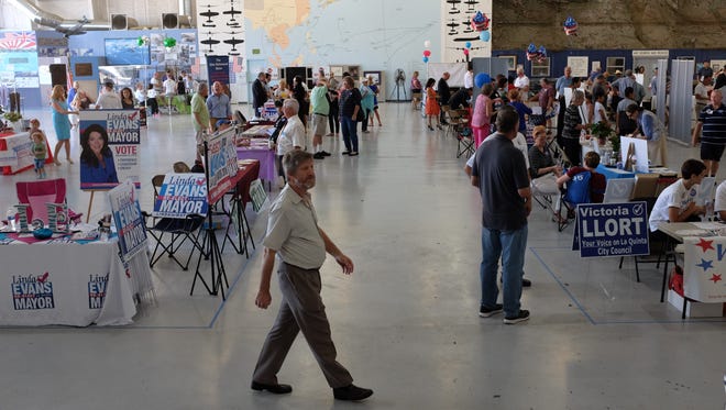 Voters attend the Political Pop Up event at the Palm Springs Air Museum on Saturday, October 1, 2016. The event lets voters meet candidates running in the November elections.