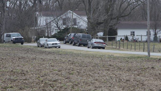 Police search the home, land and outbuildings belonging to the man who owns the land where Delphi teens were killed.