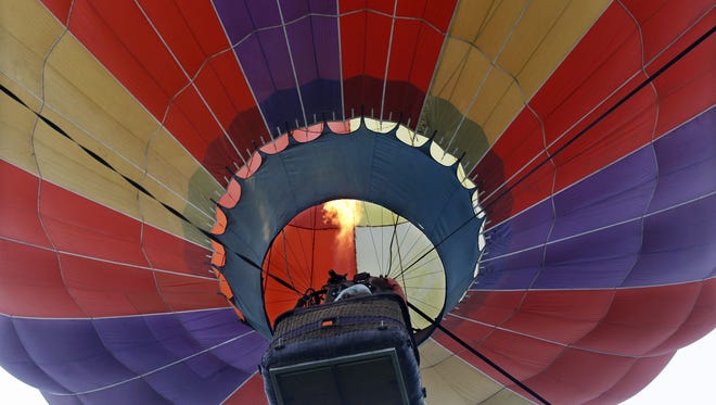 A hot air balloon is seen at the 32nd annual OuickChek New Jersey Festival of Ballooning Sunday, July 27, 2014, in Readington, N.J.