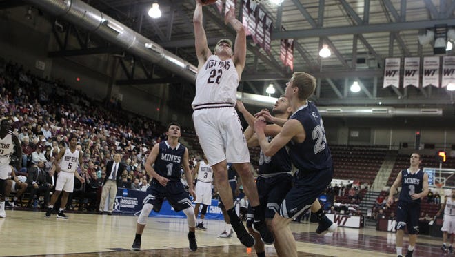 Fossil Ridge graduate Ryan Quaid, shown in a game earlier this season, scored a career-high 25 points Tuesday to help West Texas A&M to the Division II Final Four.