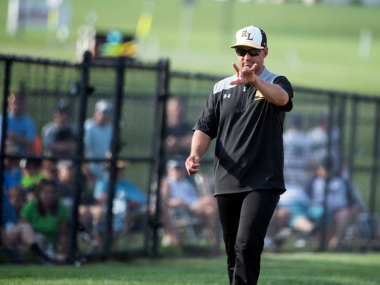 Red Lion head coach Kevin Lawrence yells out to a batter.
