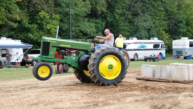 The Antique Power Show returns to Outville on July 10-11. The event features working antique farm and construction equipment, and tractor and sled pulls, among other entertainment offerings.