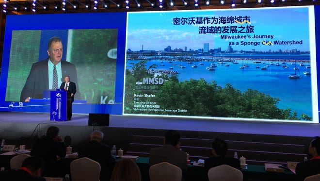 Milwaukee Metropolitan Sewerage District Executive Director Kevin Shafer speaks at a water conference in Haikou, China. Shafer described stormwater management and flood control efforts in the MMSD service area.