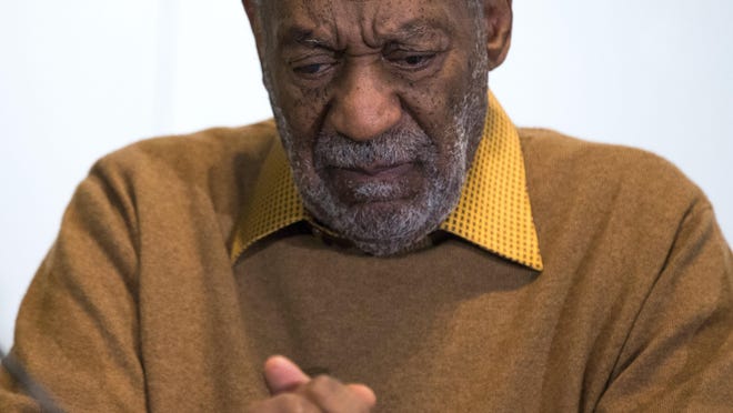 In this file photo, entertainer Bill Cosby pauses during a news conference.