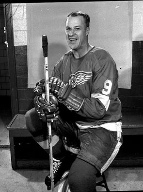 The legendary No. 9 poses for a photo in his Red Wings