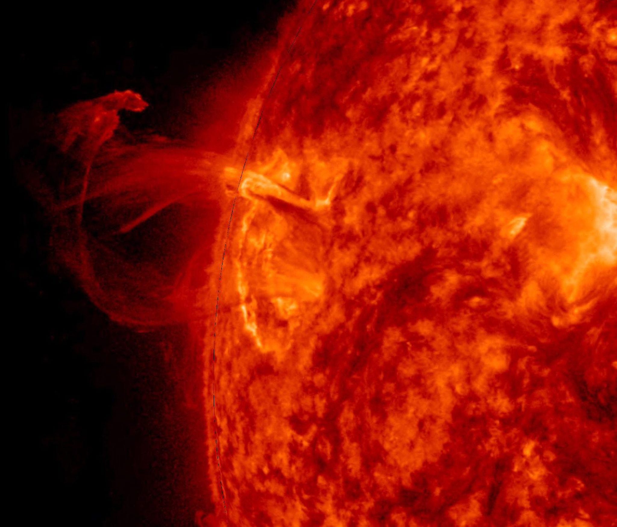 A handout picture made available by NASA's Solar Dynamics Observatory (SDO) on 21 April 2016 shows a dramatic display of a round solar filament bursting out from the Sun, in space.