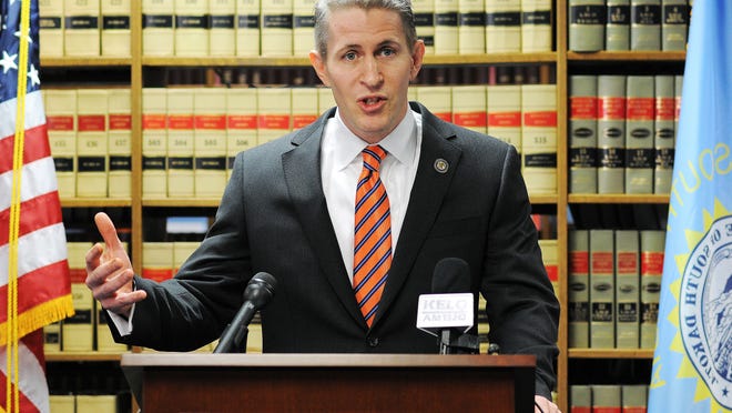 In this Feb 8, 2015, file photo, former South Dakota U.S. Attorney Brendan Johnson speaks during a news conference at the U.S. Attorney's Office in Sioux Falls.