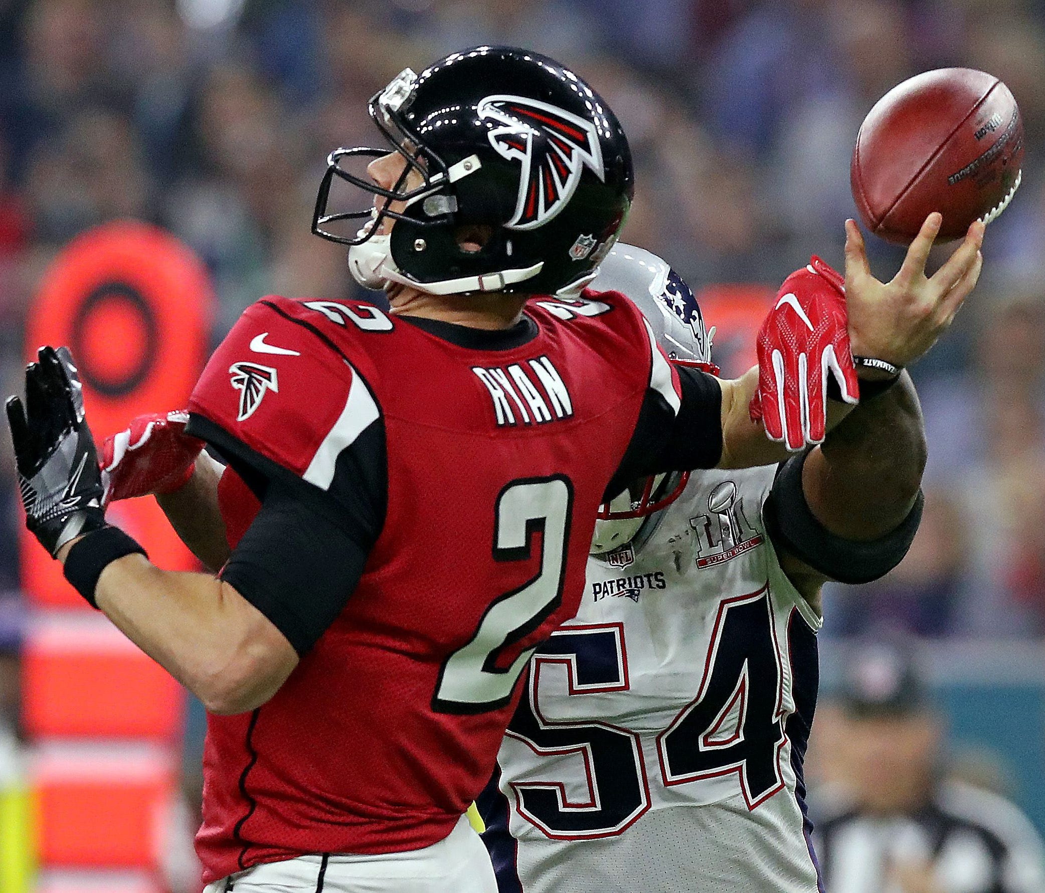 patriots middle linebacker Dont'a Hightower (54) forces a fumble by Atlanta Falcons quarterback Matt Ryan, keying the Patriots' fourth-quarter comeback.