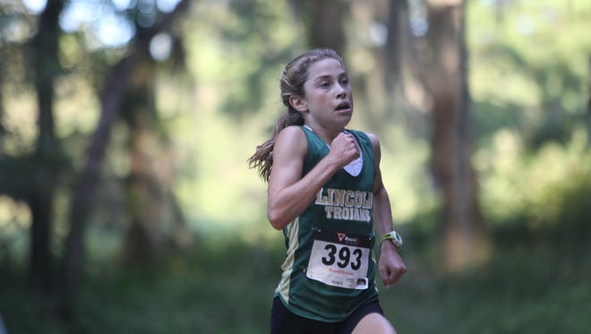Lincoln freshman Alyson Churchill won the Cougar XC Challenge on Saturday morning at Elinor Klapp-Phipps Park, running 18:46 on the challenging, hilly course.