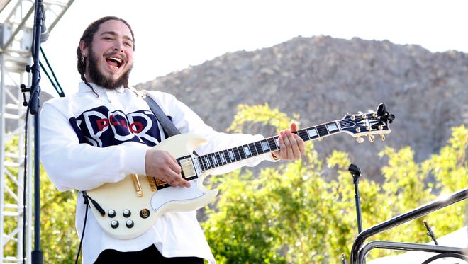 Post Malone performs on stage at the Coachella Republic Records Jaegermeister Party at Republic House on April 17, 2016 in Palm Springs, California.
