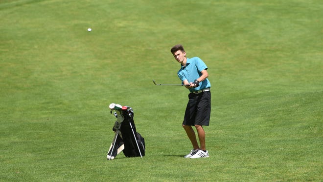 Costa Coconis hits a shot during the first day of the ZDGA Junior Amateur at Jaycees Golf Course on Tuesday.