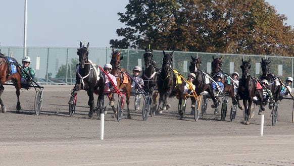 Resolve, at left, driven by Ake Svanstedt. , won the