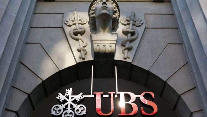 The logo of UBS is pictured on a building in Zurich, Switzerland.