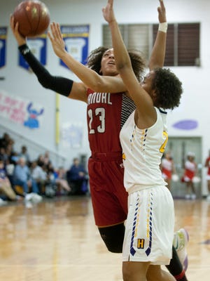 Manual guard Tonysha Curry tries to shoot over the arms of Male forward Jada Owens. 17 February 2017