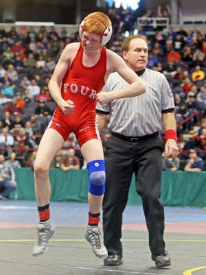 A.J. Burkhart of Waverly defeated Drew Shafer of Pal-Mac in overtime in a 99 pound semifinal match at the New York State High School wrestling championships at the Times Union Center in Albany Feb. 28, 2015.