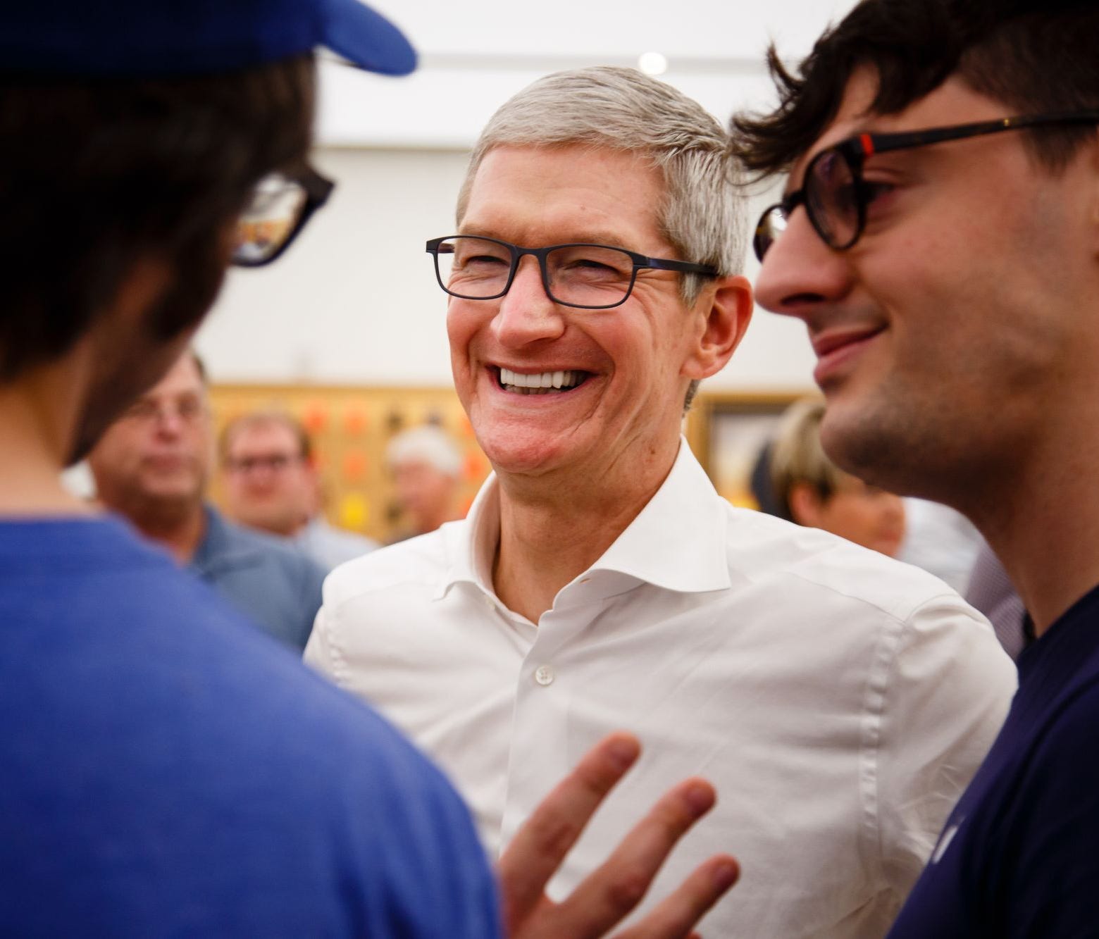 Apple CEO Tim Cook talks with employees on a visit to the West Des Moines Apple Store on Aug. 24, 2017. Cook was in Iowa announcing the company's plans for its $1.375 billion data center in Waukee, Iowa.