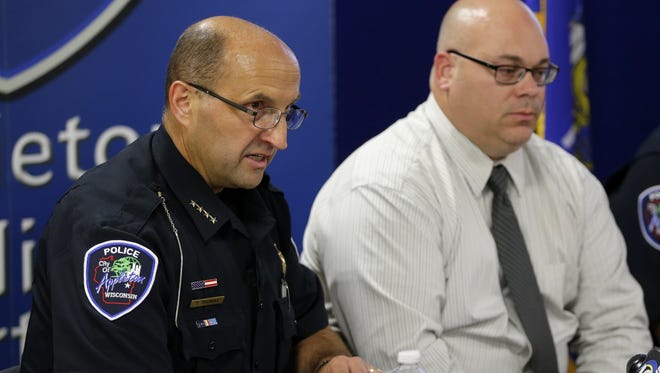 Appleton Police Chief Todd Thomas, left, and Green Bay police Lt. Gary Richgels, address a press conference on the release of the findings of the May 28 shooting involving an Appleton police officer Wednesday, June 8, 2016 in Appleton.