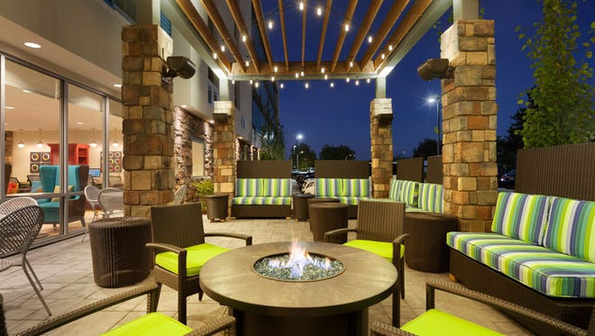The outdoor fire pit at the Home2 Suites By Hilton planned at One Bellevue Place.