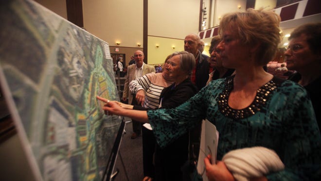 Residents review plans to develop Brandywine Country Club at a public meeting in April 2017.