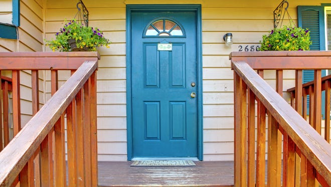 Changing the color of your front door can do wonders for your spring outlook.