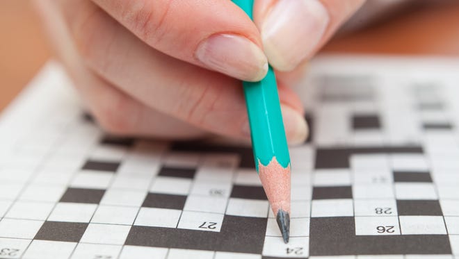 Crossword puzzle close-up.